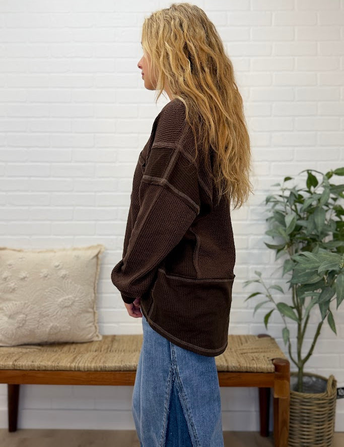 Split Neck Raw Edge Long Sleeve Ribbed Knit Top