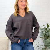 Split Neck Raw Edge Long Sleeve Ribbed Knit Top