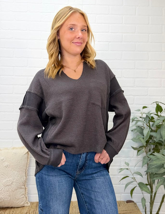 Split Neck Raw Edge Long Sleeve Ribbed Knit Top