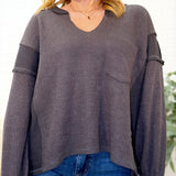 Split Neck Raw Edge Long Sleeve Ribbed Knit Top