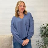 Split Neck Raw Edge Long Sleeve Ribbed Knit Top