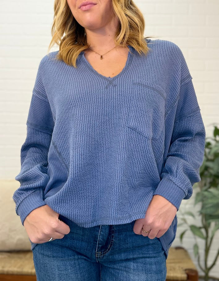 Split Neck Raw Edge Long Sleeve Ribbed Knit Top